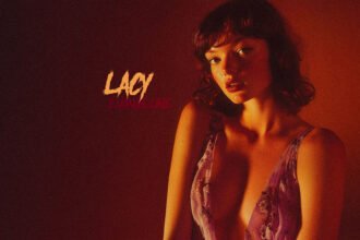 Lacy Evangeline in purple gauzy dress